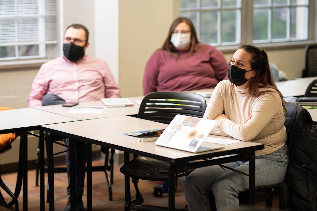 Students listening to a lecture in a clasroom